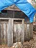 Blue Tarp Covering Cabin